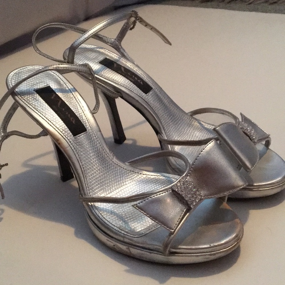 Silver heels with ankle strap and clear top